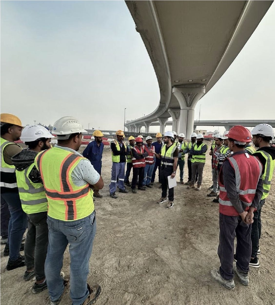 Soiltec team safety briefing on a construction site