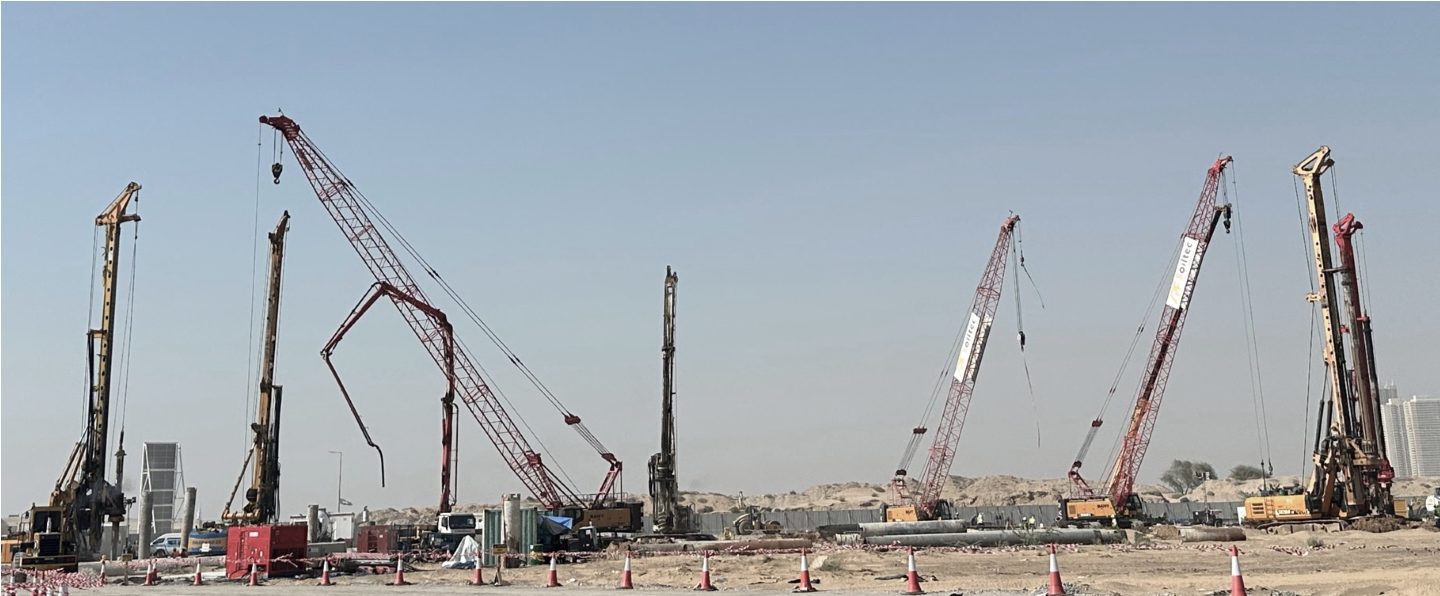 Panoramic view of piling rigs and cranes on a Soiltec construction site