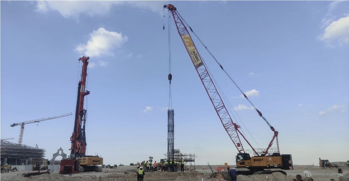 Cranes and piling equipment operating on a construction site